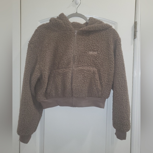 14. NWT SKIMS COZY KNIT TEDDY CROP FULL ZIP HOODIE IN DESERT SIZE XXS - Picture 5 of 9